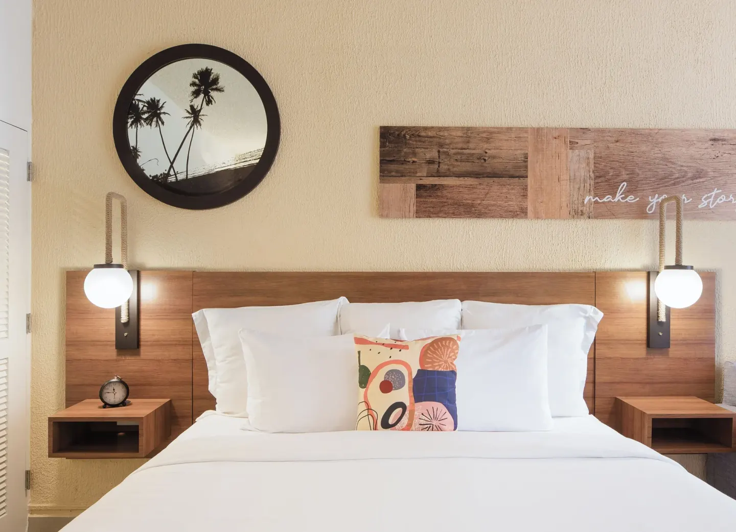 King bed headboard detail in a poolside room at Wyndham Palmas Beach and Golf Boutique Resort.
