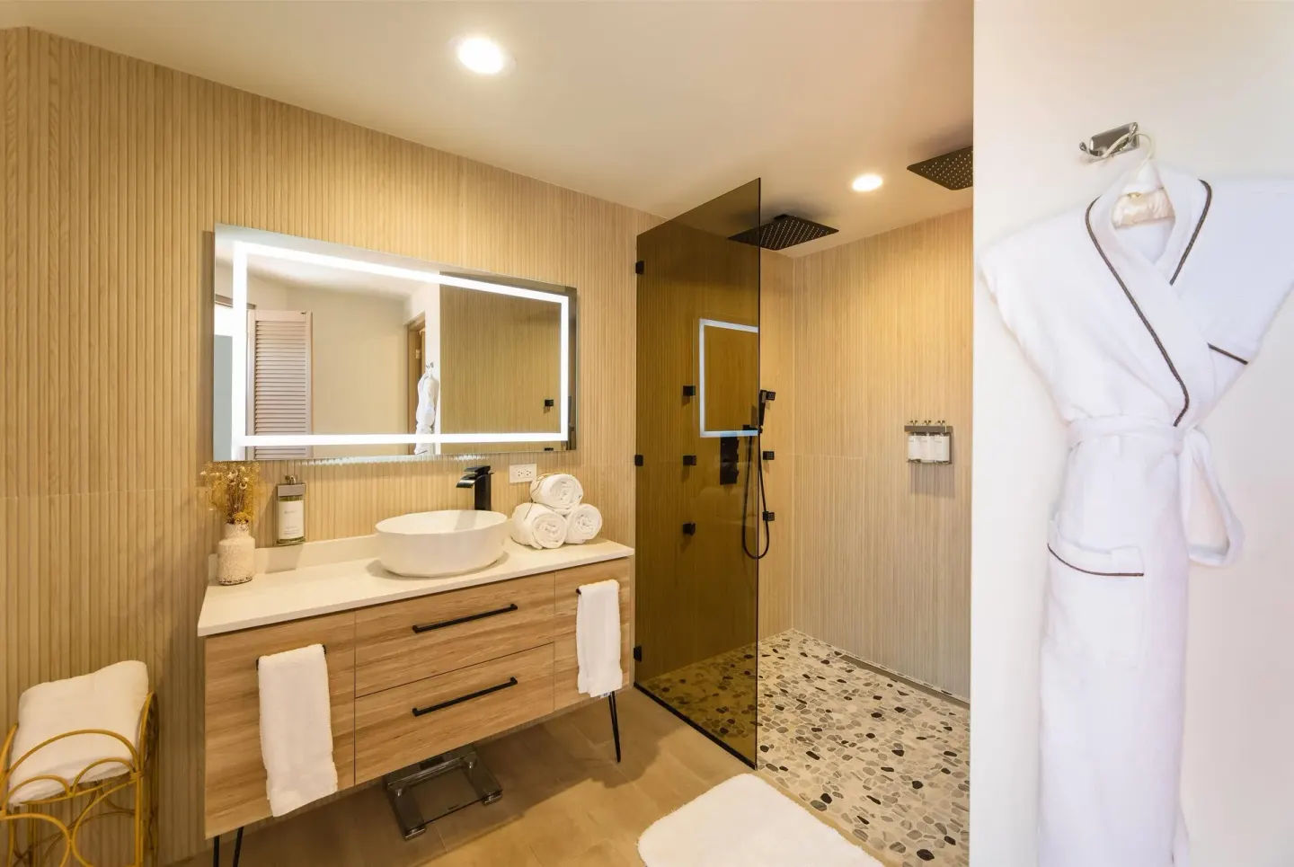 Suite bathroom vanity and walk-in shower at Wyndham Palmas Beach and Golf Boutique Resort.