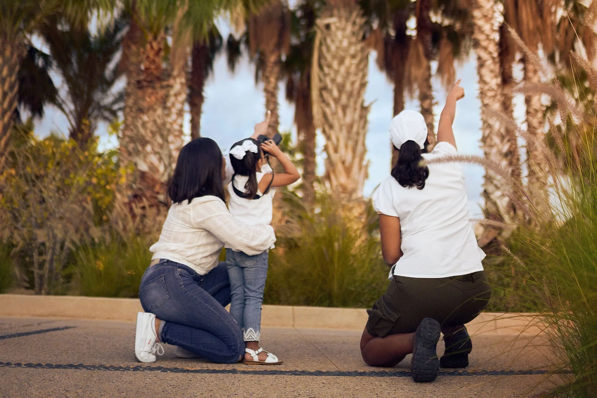 Family nature walk among palms at Zadún, a Ritz-Carlton Reserve, Los Cabos.