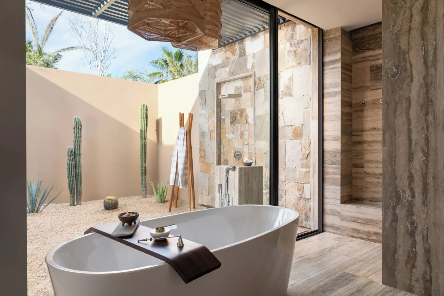 Freestanding bathtub beside a private cactus garden at Zadún, a Ritz-Carlton Reserve, Los Cabos.