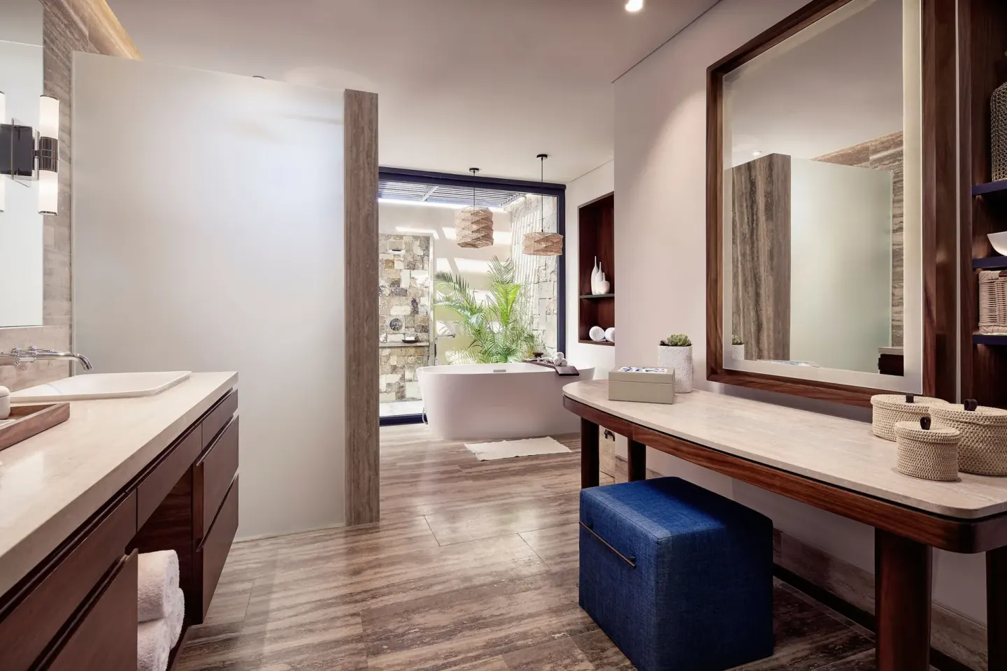 Guest bathroom vanity and bathtub area at Zadún, a Ritz-Carlton Reserve, Los Cabos.