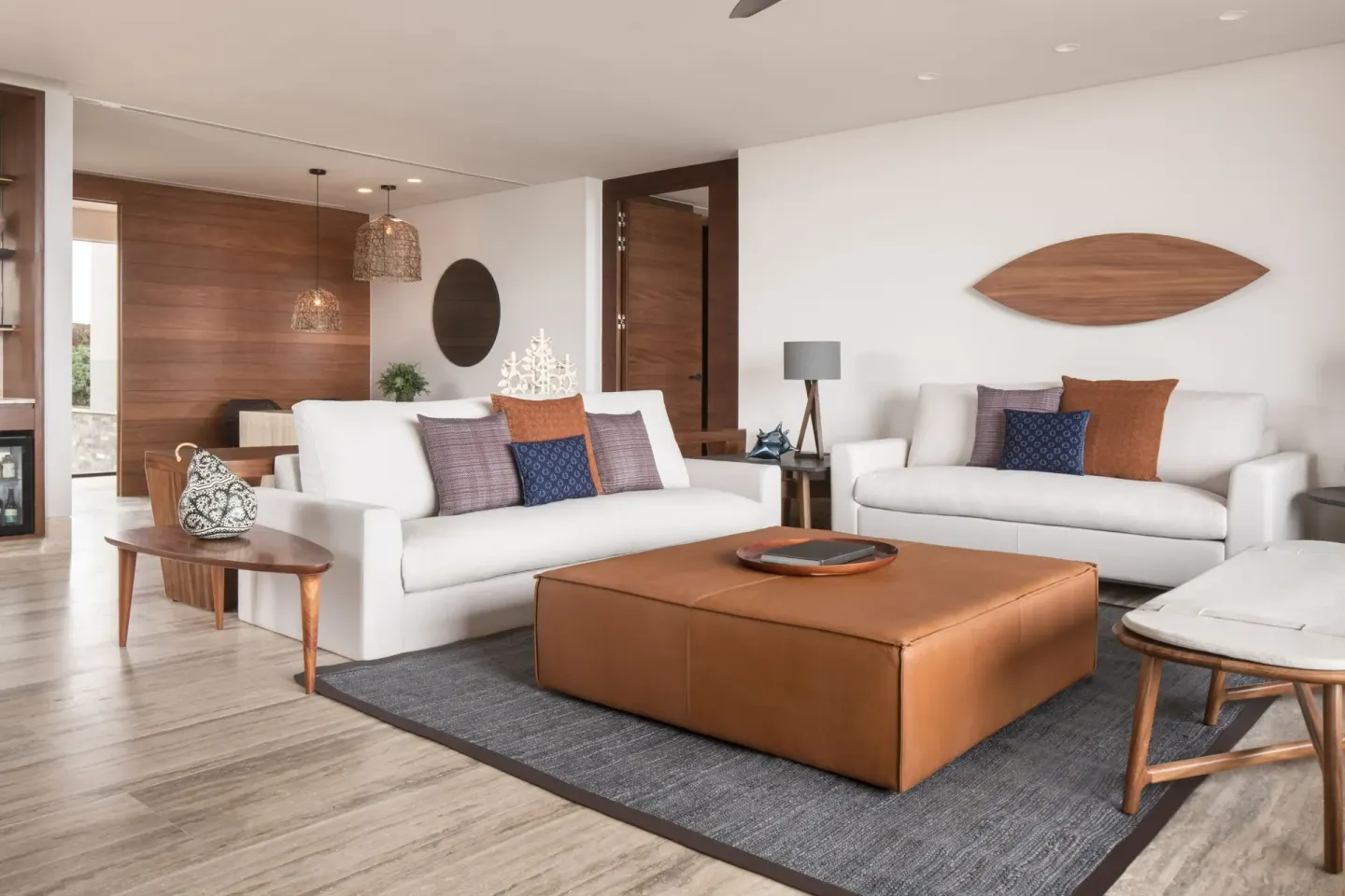 Bright living room with white sofas at Zadún, a Ritz-Carlton Reserve, Los Cabos.