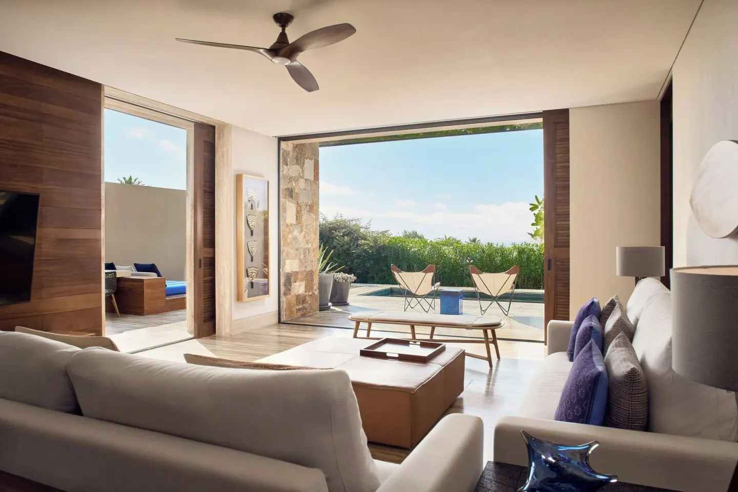 Guest room living area opening to a private terrace at Zadún, a Ritz-Carlton Reserve, Los Cabos.