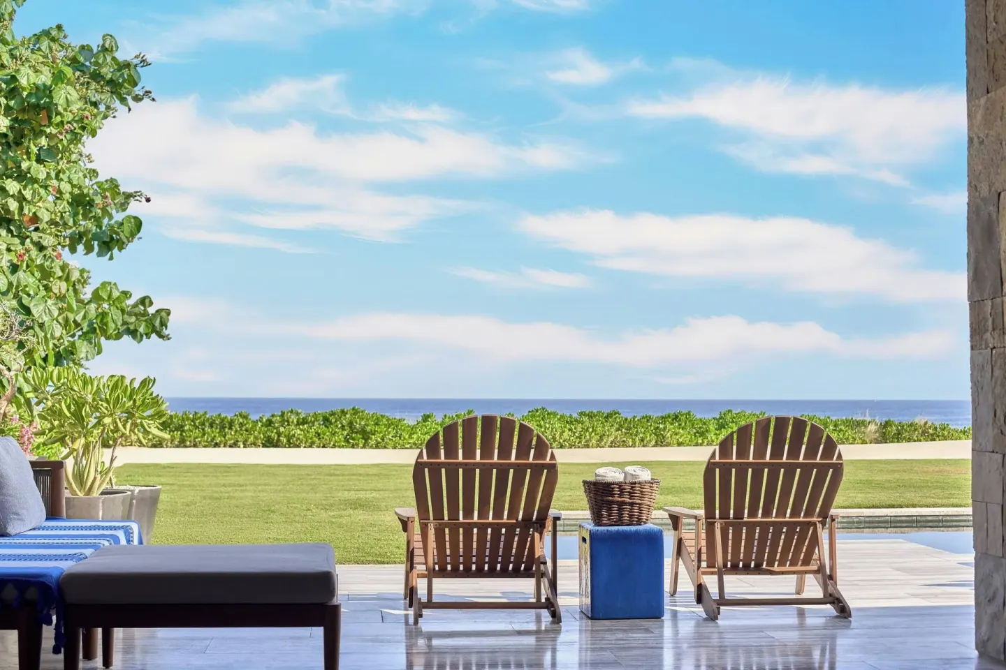Ocean-facing patio with lounge chairs at Zadún, a Ritz-Carlton Reserve, Los Cabos.