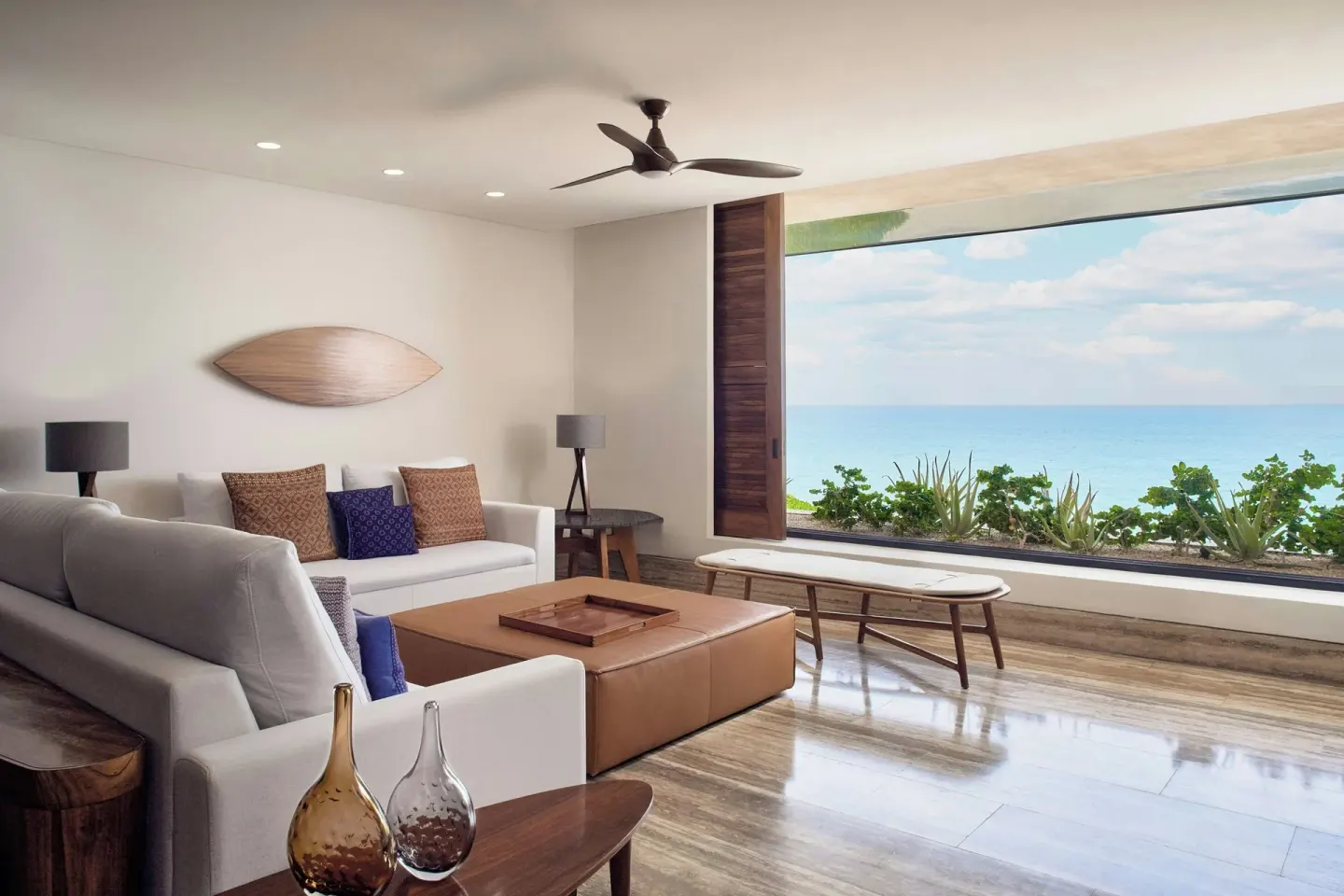 Ocean-view living room with white sofas at Zadún, a Ritz-Carlton Reserve, Los Cabos.
