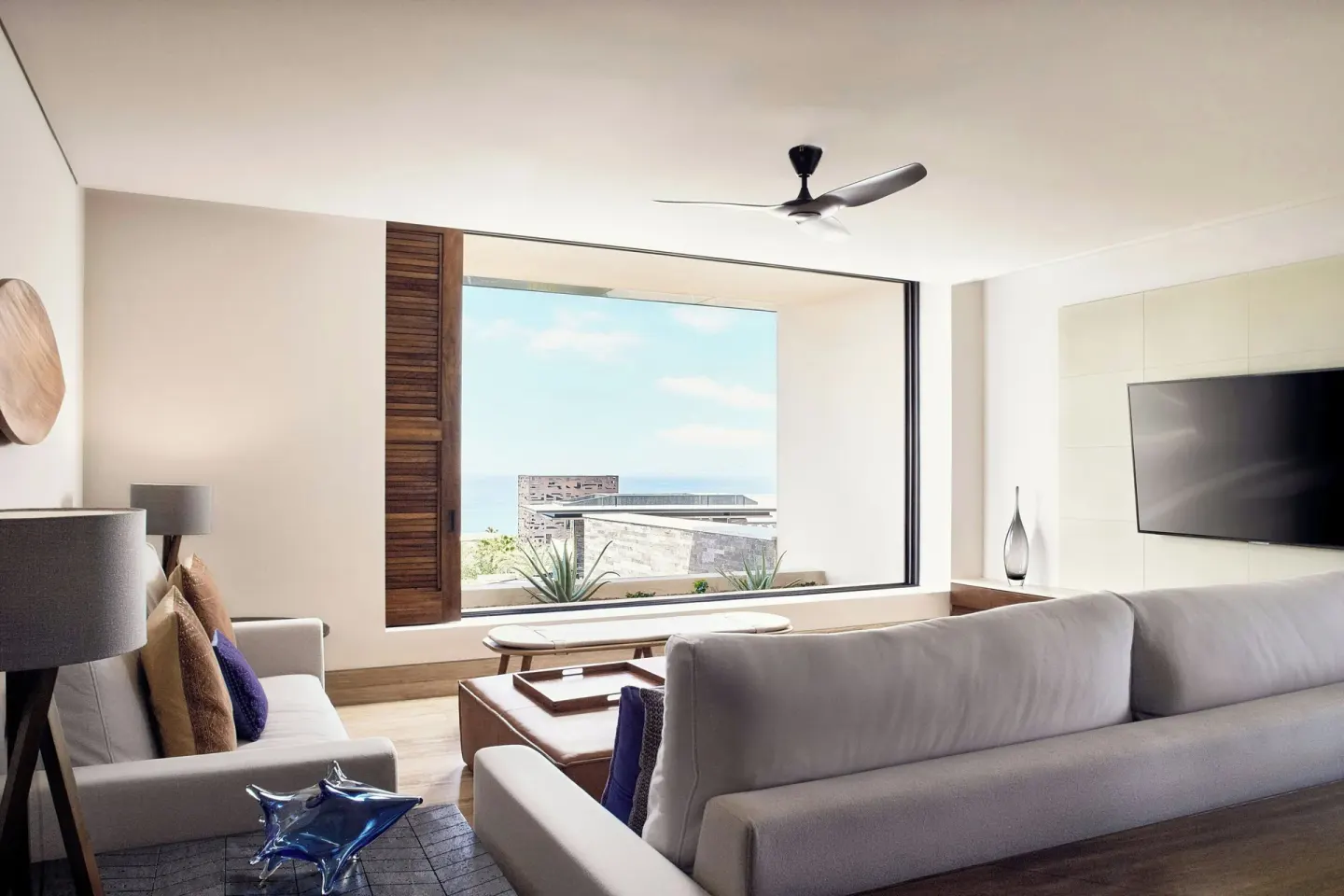 Living room with sofas and ocean view at Zadún, a Ritz-Carlton Reserve, Los Cabos.