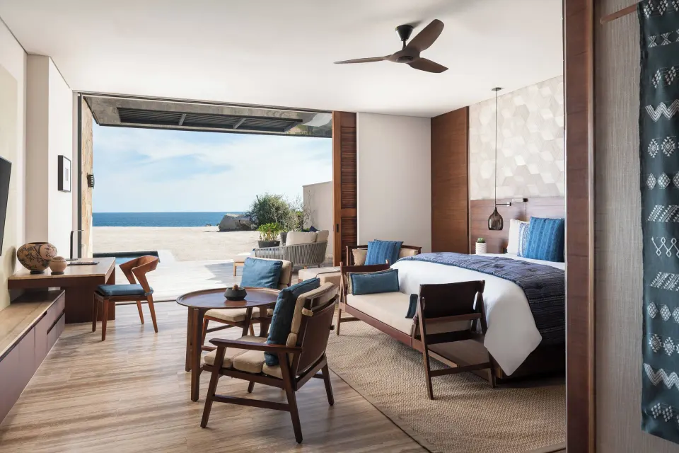 Oceanfront guest room with king bed and terrace at Zadún, a Ritz-Carlton Reserve, Los Cabos.