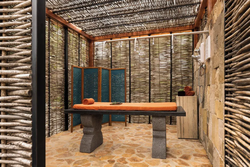Outdoor treatment area with massage table at Zadún, a Ritz-Carlton Reserve, Los Cabos.
