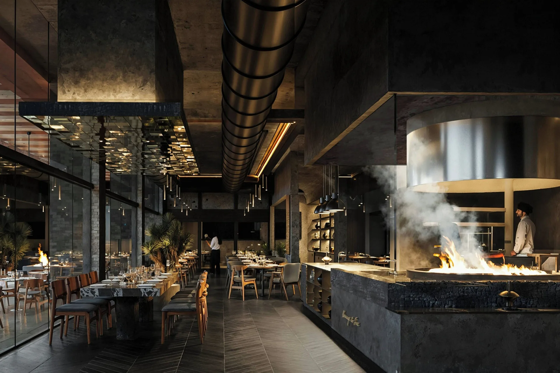 Open-fire restaurant kitchen and dining room at Zadún, a Ritz-Carlton Reserve, Los Cabos.