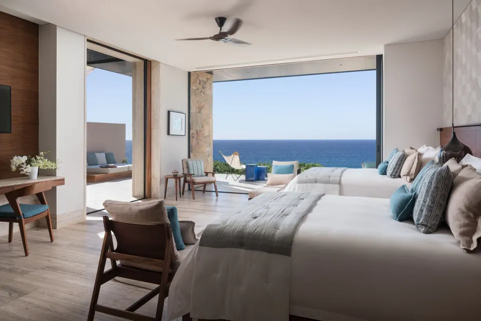 Two-bed ocean-view room at Zadún, a Ritz-Carlton Reserve, Los Cabos opening onto a terrace.