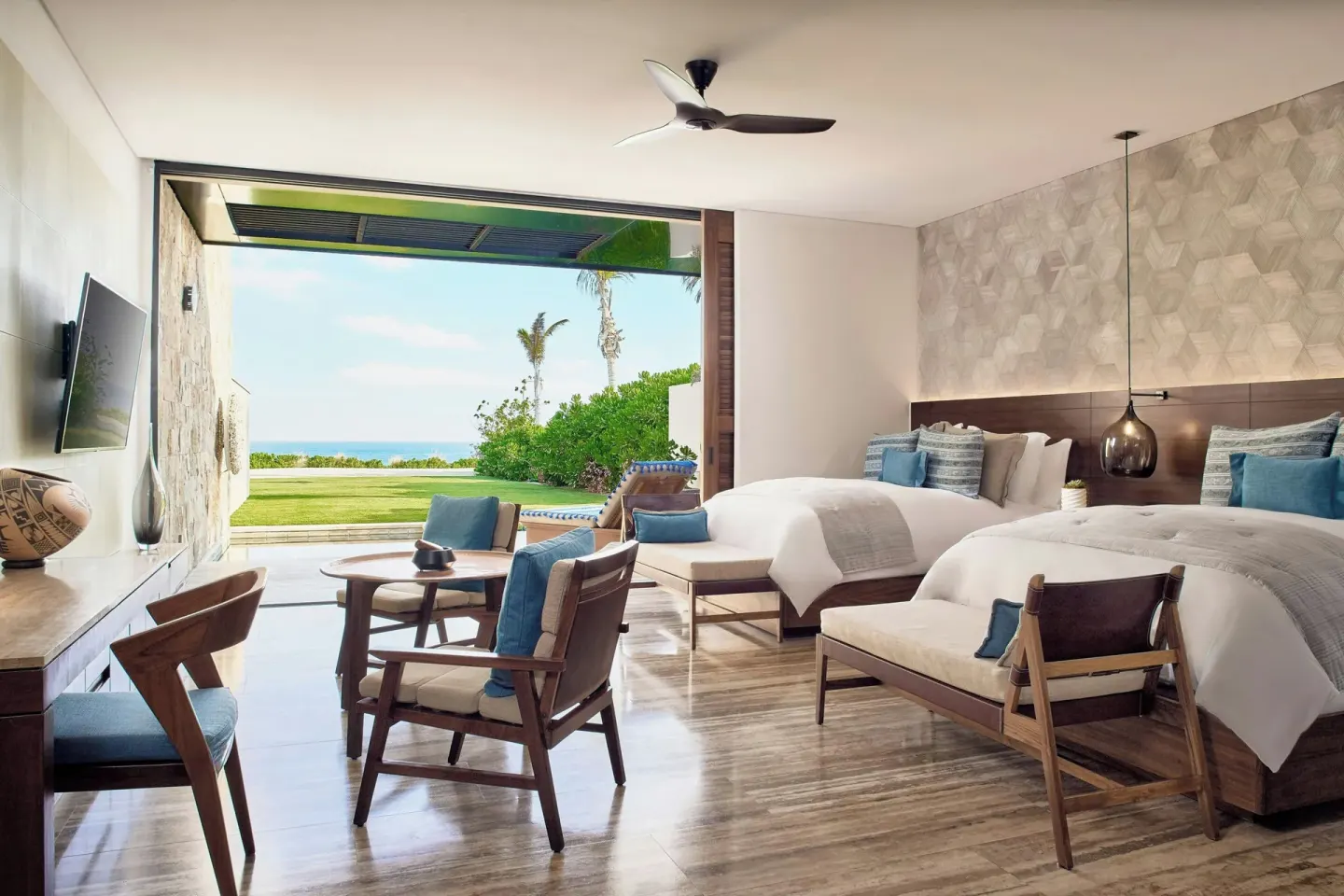 Oceanfront terrace room with two beds and patio view at Zadún, a Ritz-Carlton Reserve, Los Cabos.