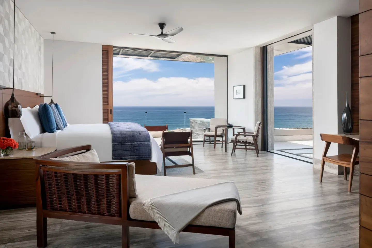 Bright king room with terrace doors and ocean horizon at Zadún, a Ritz-Carlton Reserve, Los Cabos.