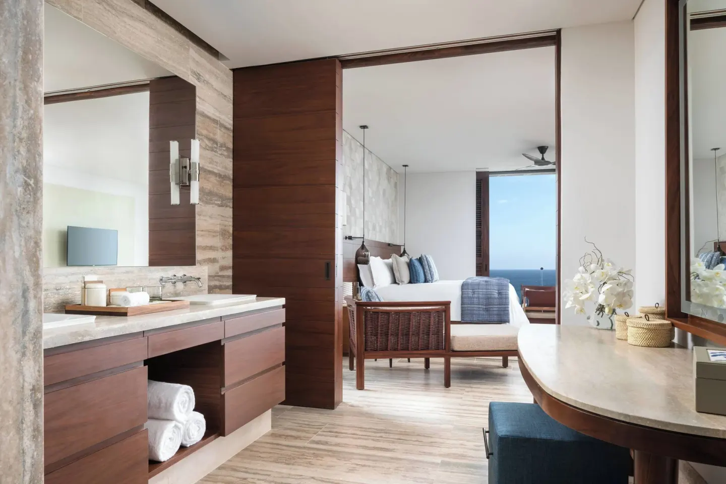 Bathroom vanity opening to an oceanfront two-bed room at Zadún, a Ritz-Carlton Reserve, Los Cabos.