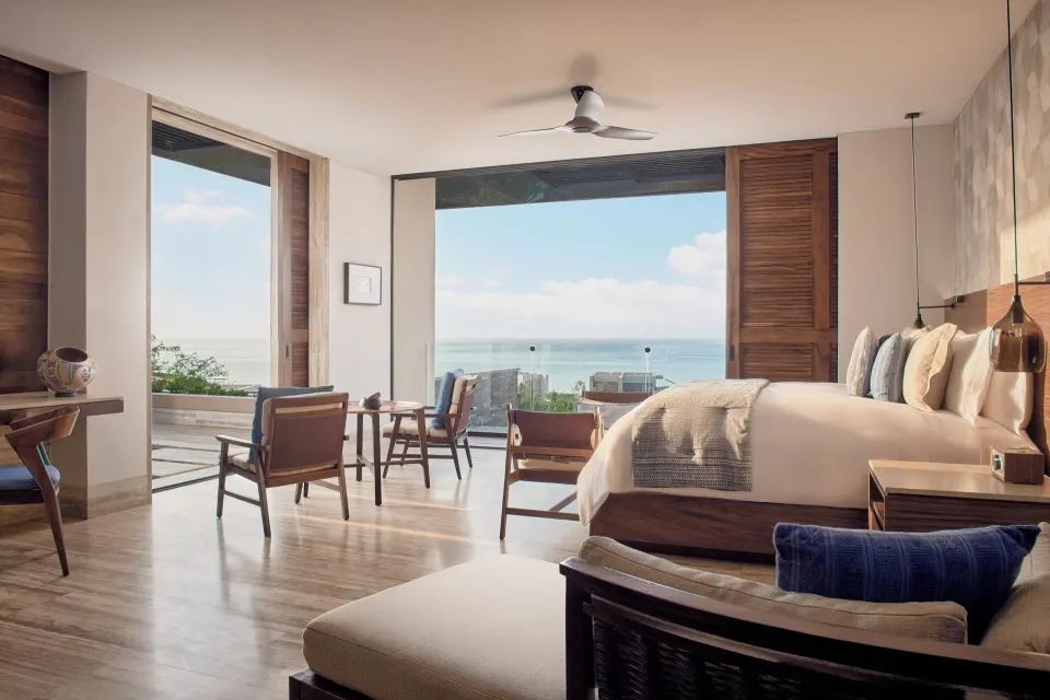 Oceanfront two-bed guest room with terrace seating at Zadún, a Ritz-Carlton Reserve, Los Cabos.
