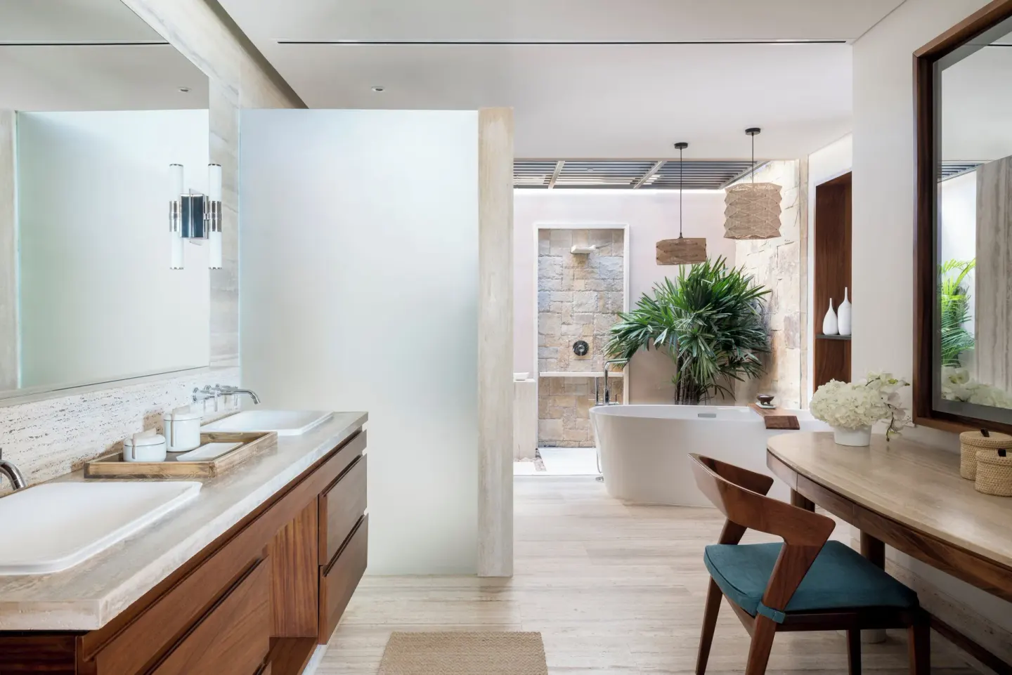 Bathroom with double sinks, soaking tub, and dressing table at Zadún, a Ritz-Carlton Reserve, Los Cabos.