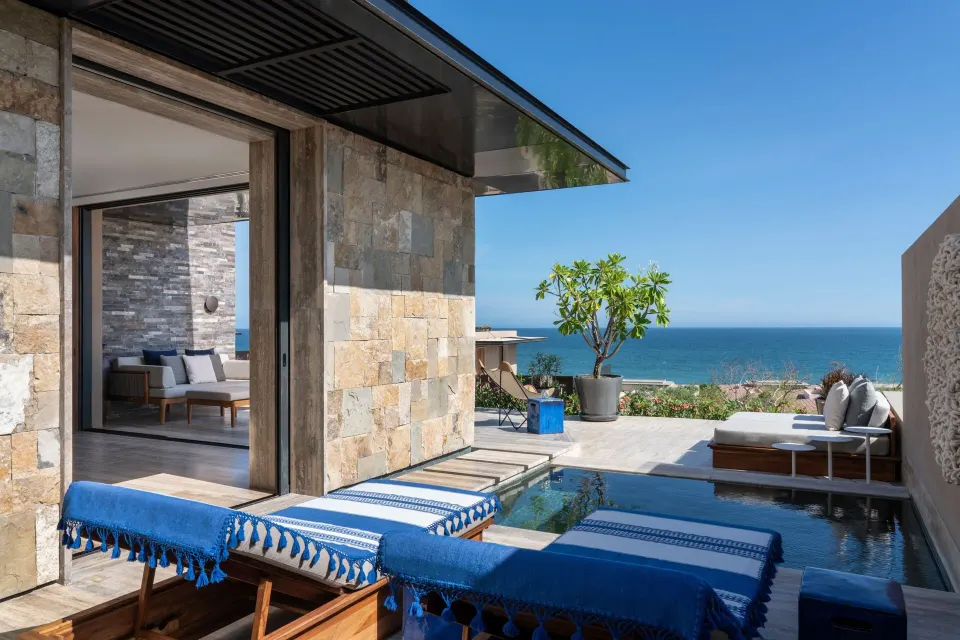 Oceanfront terrace with plunge pool and loungers at Zadún, a Ritz-Carlton Reserve, Los Cabos.
