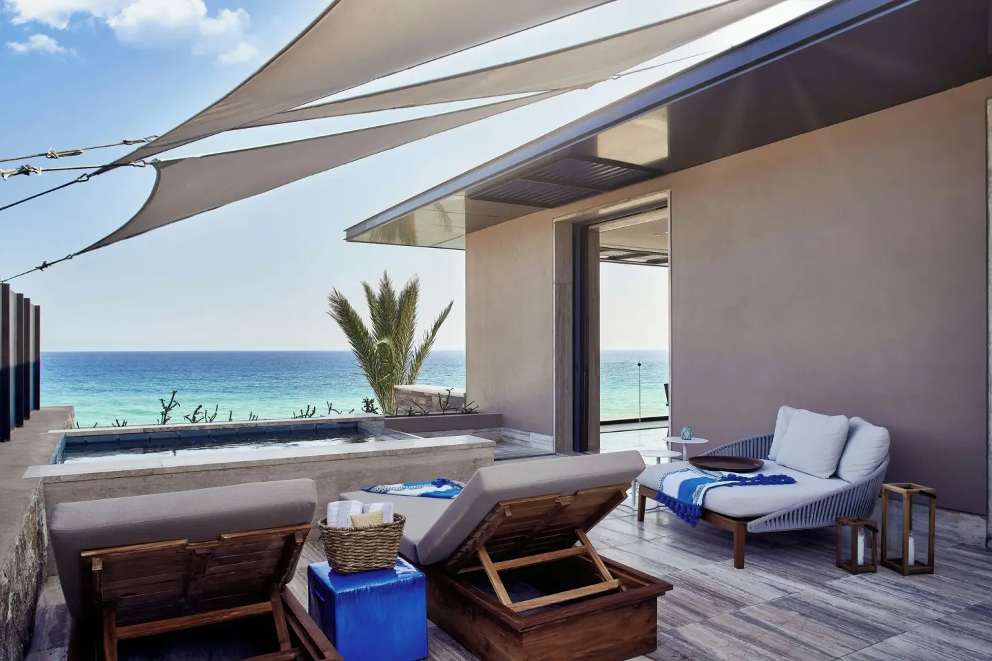 Oceanfront terrace with shaded loungers and plunge pool at Zadún, a Ritz-Carlton Reserve, Los Cabos.