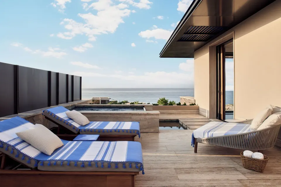 Private oceanfront terrace with loungers and plunge pool at Zadún, a Ritz-Carlton Reserve, Los Cabos.