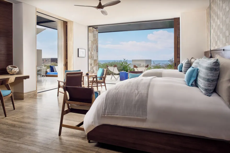 Oceanfront two-bed room with terrace seating at Zadún, a Ritz-Carlton Reserve, Los Cabos.