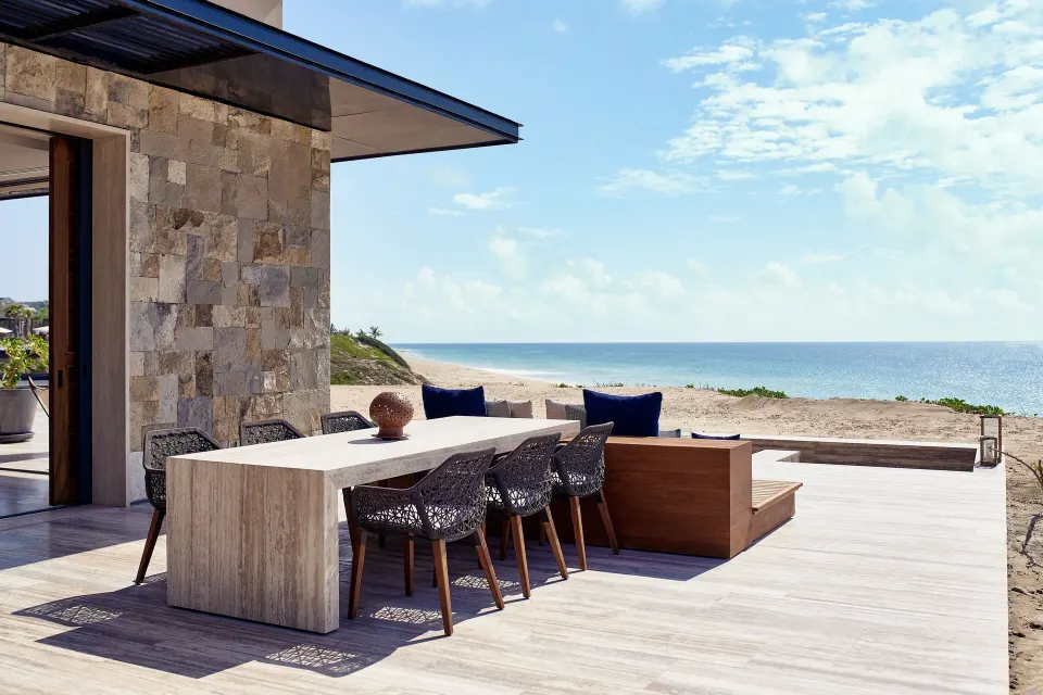 Suite private pool deck with dining table and ocean view at Zadún, a Ritz-Carlton Reserve, Los Cabos.