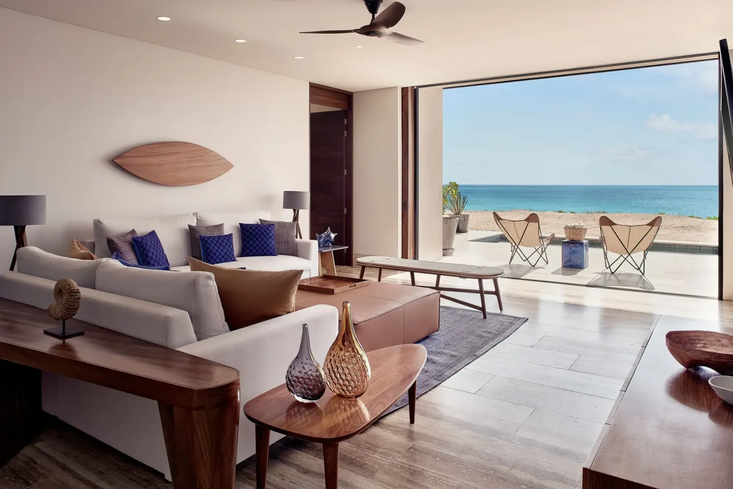 Suite living room with terrace and ocean view at Zadún, a Ritz-Carlton Reserve, Los Cabos.