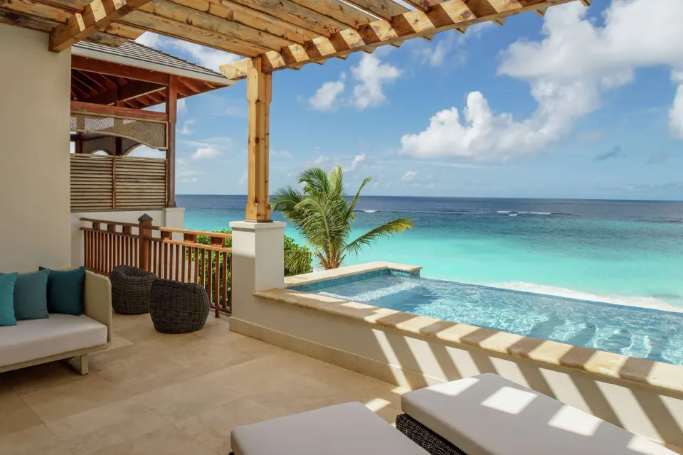 Presidential Suite covered terrace with plunge pool and ocean view at Zemi Beach House.